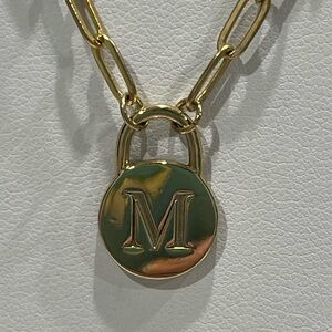 Gold tone paper clip necklace with M charm